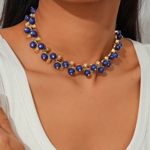 Elegant gold leaf necklace with royal blue beads, minimalist water drop floral neck jewelry