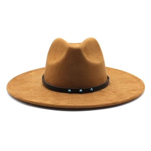 Close-up of brown suede wide brim fedora with turquoise beads on black leather band
