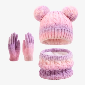 Detail of cable knit texture and soft fleece lining on winter hat, scarf, and gloves set