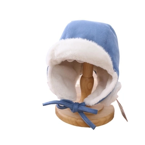 Blue baby winter trapper hat with warm faux fur lining and ear flaps for toddlers