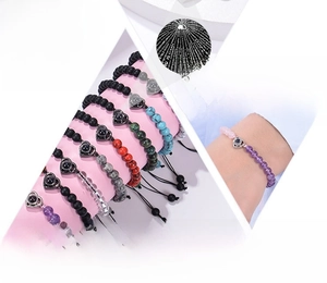 Detailed view of projection bracelet showing 100 languages I love you with natural stones