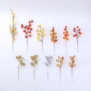 Various artificial red winterberry branches in multiple colors for home festive decoration