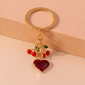 Golden cherry and red glitter heart keychain charm for handbag decoration