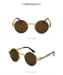 Detail of gold metal punk sunglasses with intricate engraving and brown lenses