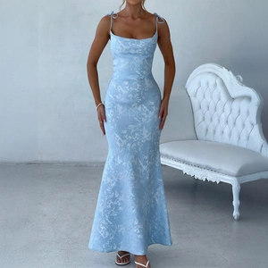 Elegant blue floral jacquard evening gown with spaghetti straps and mermaid hemline