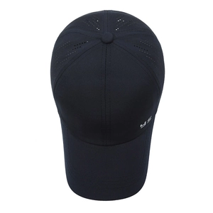 Navy blue breathable baseball cap with laser-cut holes and silver YS logo on the side