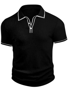 Detail of vertical knit texture and white striped cuffs on a black men's Polo shirt