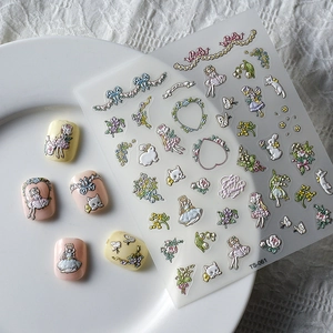 Autocollants ongles 5D en relief avec motifs floraux et animaux sur assiette blanche