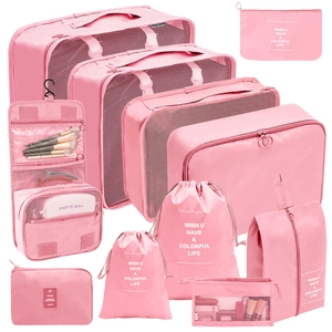 Pink travel packing cubes set including mesh bags shoe pouch and toiletry kit