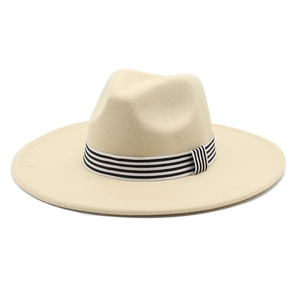 Detail of beige wide brim wool fedora hat with black and white striped ribbon band