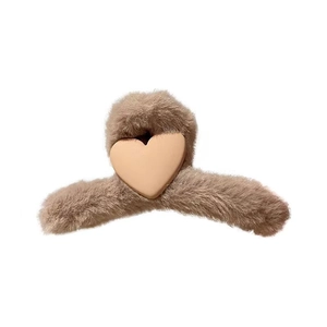 Brown plush heart hair claw clip for women featuring a soft minimalist autumn aesthetic