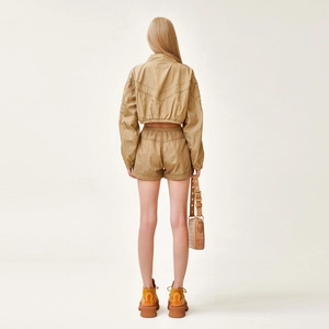 Rear view of khaki jogger shorts and jacket set showing premium fit and nylon fabric