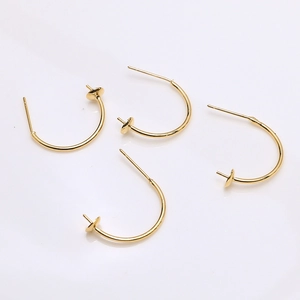 Macro view of 18K gold plated half-round C-shape earring hooks for DIY jewelry making