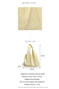 Detail view of large capacity hollow grid canvas tote bag fabric texture and size dimensions