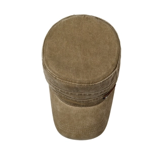 Close-up of vintage washed cotton cadet hat with leather patch and reinforced stitching