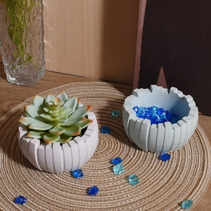 Detailed top view of DIY semicircular irregular striped silicone mold plaster planter pots