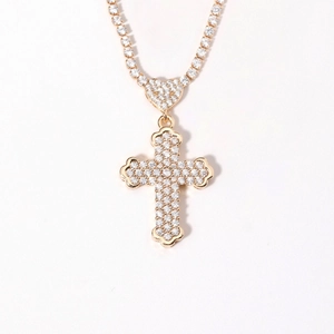 Luxurious gold cross pendant necklace with heart link and sparkling zircon stones