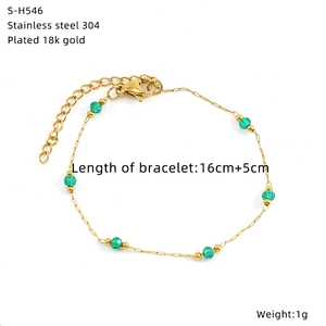 Detail of 18K gold-plated stainless steel chain featuring multifaceted green beads