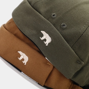 Army green and caramel brimless hats featuring high-quality polar bear embroidery
