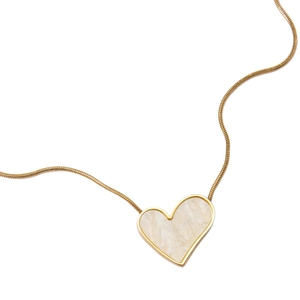 Minimalist gold heart necklace with marble texture pendant on sleek snake chain