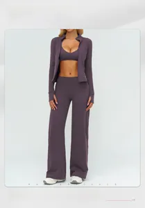 Three-piece purple yoga set featuring a zip jacket, V-neck bra, and wide-leg sports pants