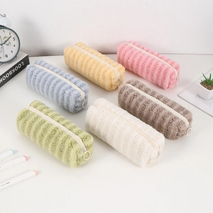 Plush corduroy pencil case in six pastel colors featuring a soft texture and zipper closure