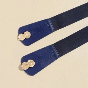 Detail of blue elastic belts with embossed gold circular double buckles and PU leather