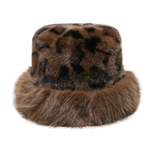 Detailed view of the soft leopard print faux fur texture on a warm winter bucket hat