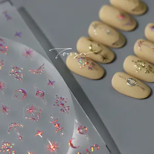 Macro detail of holographic laser nail stickers with gold moon and star pattern J75
