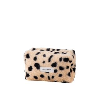Leopard print plush makeup bag with Love Youth label in a rectangular octagonal shape