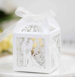 Detailed laser cut Mr & Mrs hollow candy box in white with silk ribbon and bride silhouette