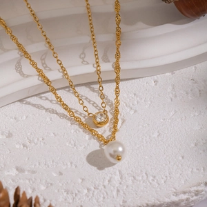 Double-layer gold stainless steel necklace with white pearl and sparkling zircon pendant