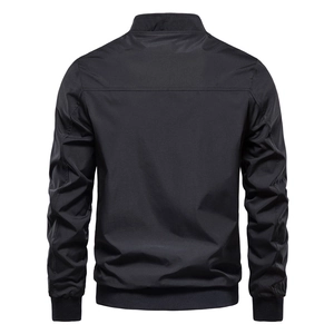 Rear view of casual men's lightweight jacket with ribbed cuffs and stand collar details