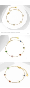 Detailed macro view of gold-plated titanium steel chain with colorful zircon gemstones