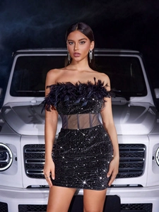 Sexy black strapless sequined mini dress with feather trim and sheer mesh waist