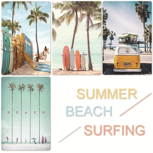 Detail of four vintage tin signs featuring summer beach surfing and retro van designs