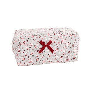 Floral makeup bag with red bow and small flower print on beige fabric, spacious travel pouch
