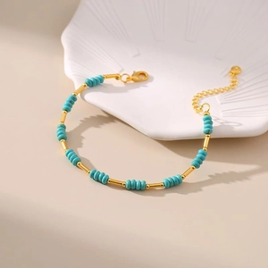 Handmade turquoise bead bracelet with 18K gold plated copper tubes and lobster clasp
