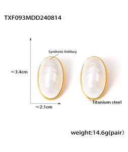 Detail of oval mother of pearl earrings in gold titanium steel with 18k gold plating