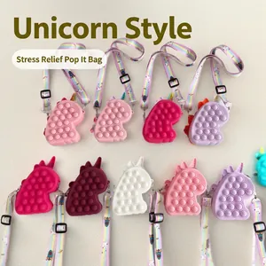 Unicorn silicone pop-it shoulder bag for kids in multiple vibrant colors and rainbow strap
