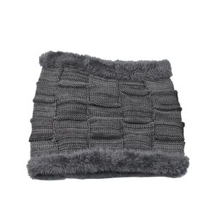 Close-up of grey checkered knit neck warmer with plush faux fur lining for winter warmth