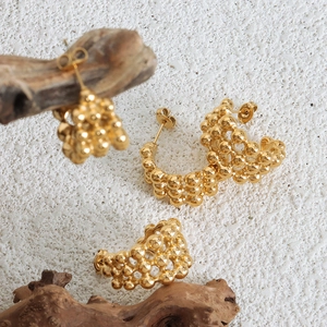 Minimalist gold-plated stainless steel hoop earrings with layered bead texture design