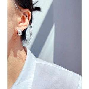 Silver wide hoop earrings with molten texture and sparkling pave-set zircons
