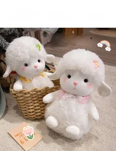 Detailed close-up of two white plush sheep toys with lace collars and floral head decorations