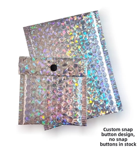 Detail of rose red laser bubble mailer showing button closure and iridescent texture