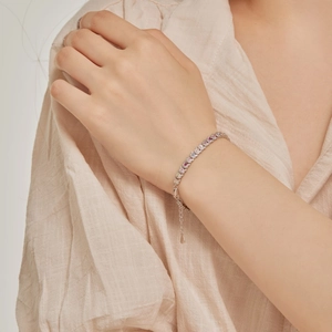 Elegant S925 sterling silver bracelet for women featuring colorful zircon teddy bear charms