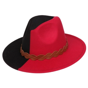 Detail view of the red and black two-tone felt fedora with a brown braided leather band