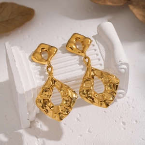 Minimalist gold stainless steel earrings with irregular hammered texture and geometric shape