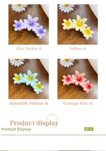Macro detail of glossy resin plumeria hair clips in vibrant gradient candy colors