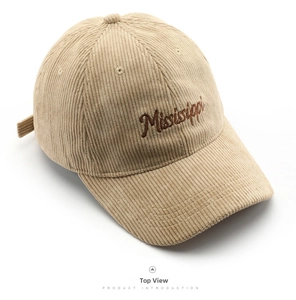 Top view of beige corduroy baseball cap showing textured fabric and Mississippi embroidery